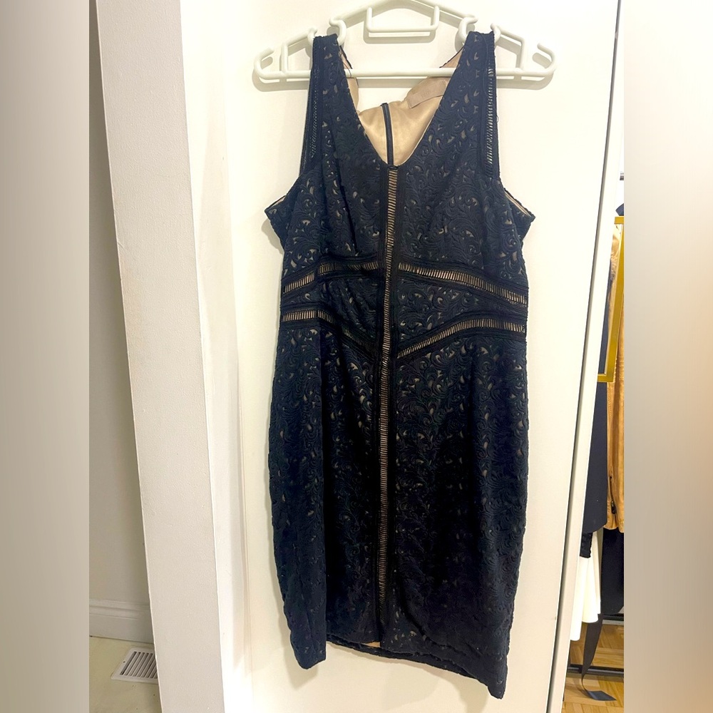 Sleeveless black lace dress